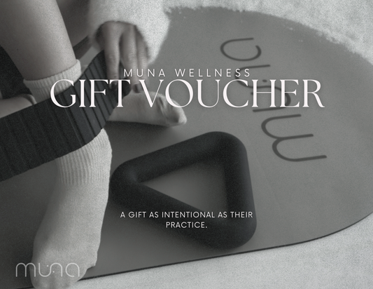 Muna Wellness gift voucher with a person on a yoga mat, featuring the Muna logo.